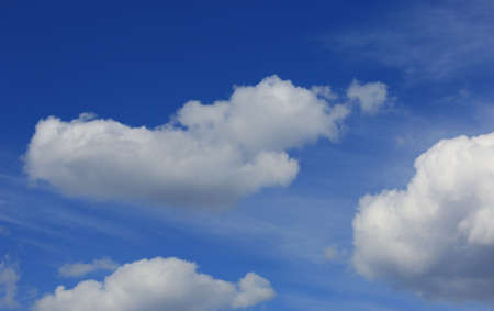 Nice white clouds in blue sky at spring dayの写真素材