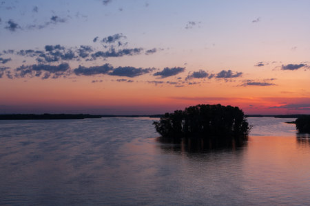 nice susnet on river. quiet landscape on Dnipro river in Ukraineの写真素材
