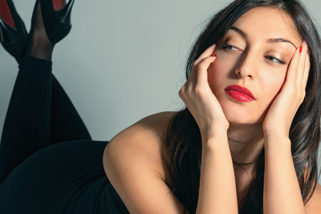 Fashion portrait of a beautiful young sexy womanの写真素材