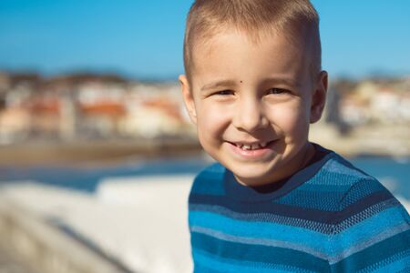 Portrait of a happy child closeup outdoorsの写真素材