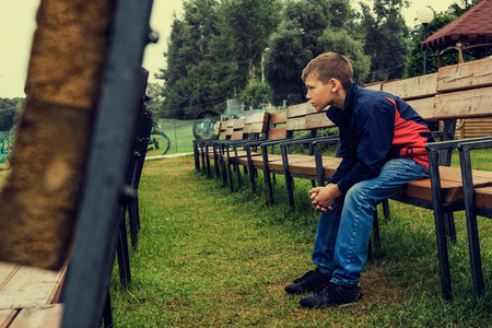 Portrait of a pensive teenの写真素材