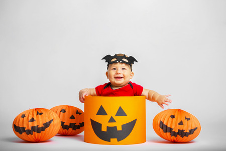 Portrait of a happy child in the style of Halloweenの写真素材