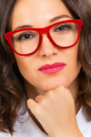 Portrait of a beautiful woman with glasses. Female face closeupの写真素材