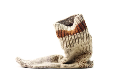 A used sock isolated on a white background