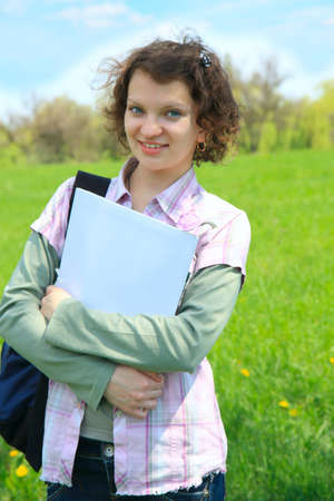 A Female Teenage Student In summer Parkの写真素材