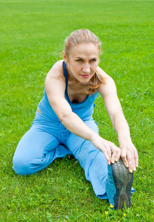 Attractive a Woman stretching before Fitness and Exerciseの写真素材