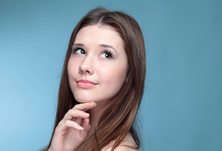 Portrait girl in thoughtの写真素材