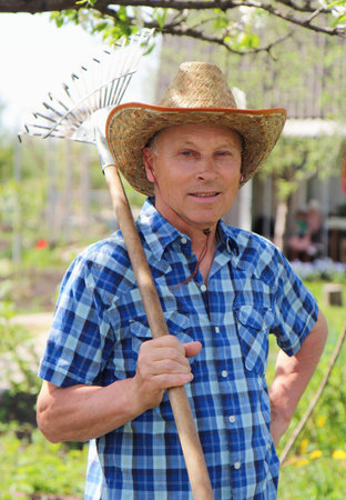 mature man working in the gardenの写真素材