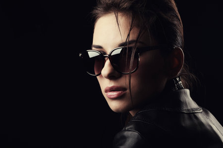 Portrait of a beautiful girl in glasses.の写真素材