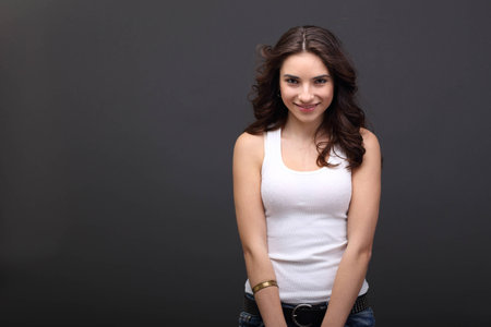 Young  beautiful girl in jeans.の写真素材