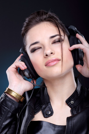 Attractive girl with headphones.の写真素材