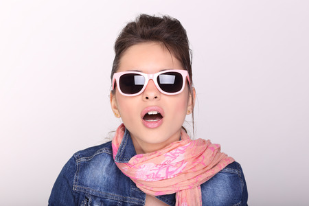 A young beautiful womanl in glassesの写真素材