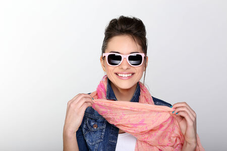 A young beautiful womanl in glassesの写真素材