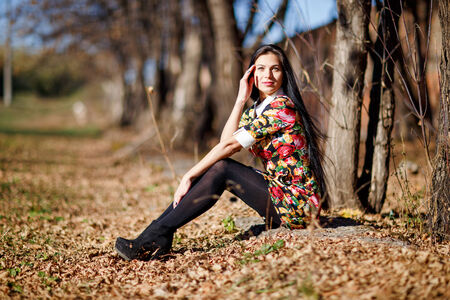 Young girl in autumn  parkの写真素材