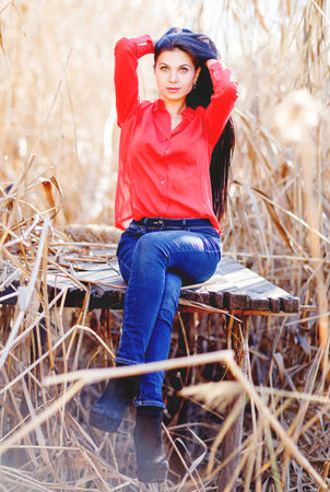 Young girl in autumn  parkの写真素材