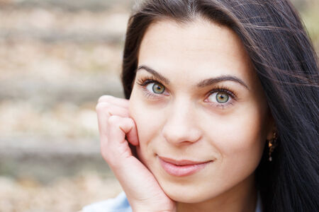 Portrait of a beautiful girl outdoor.の写真素材