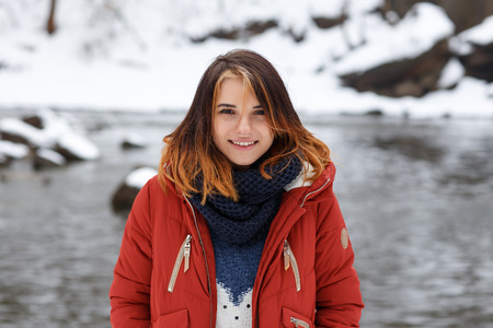 Photo beautiful woman in winter park. Outddor.の写真素材