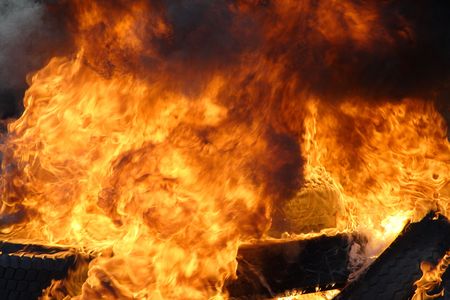 Big burning fire with black smoke