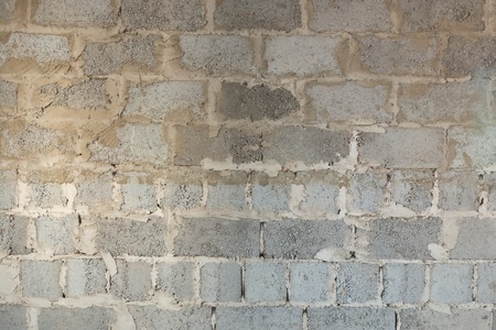 The wall, built of gypsum blocks with natural lightの写真素材