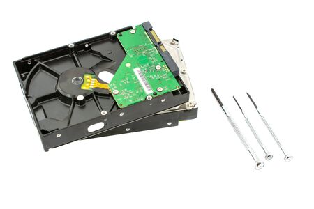 Repairing hard drive in service center HDD recovery. Data storage. Recover lost data. Screwdriver...
