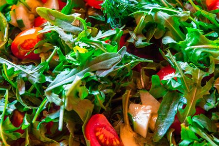 ix of fresh green salad leaves with arugula. Top viewの写真素材