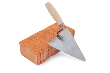 Mason tools. Brick and trowel isolated on white background. Concept of the construction. concept of the constructionの写真素材