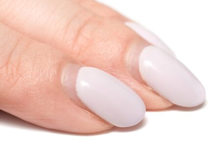 Overgrown gel polish nails on female hands isolated on a white background. Nails care. Time for...