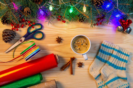 Christmas composition made of fir tree branches, present gift on white table background. Christmas,...
