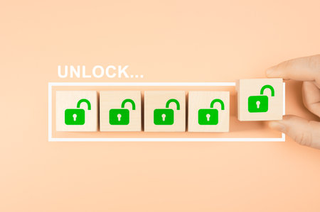Unlock concept. Hand putting wooden cube block shape with unlock icon sign on progress bar. OPEN new business opportunitiesの写真素材