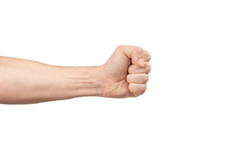 male hand fist. Males hand with a clenched fist isolatedの写真素材