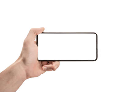 mockup phone horizontal. Hand Holding The Black Smartphone and Modern Frameless Design. Isolated man...