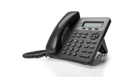 black telephone with VOIP isolated on white background. customer service support, call center concept.の写真素材
