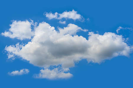 cloud formations isolated on blue. clouds and cloud formations isolated against the blue solid color background. Beautiful sky for your disignの写真素材
