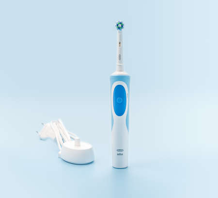 Russia, Moscow, july 22, 2021: Braun Oral-B toothbrush rechargeable electric toothbrush set with charger. Concept of professional oral care and healthy teeth by using ultrasonic smart toothbrushのeditorial素材