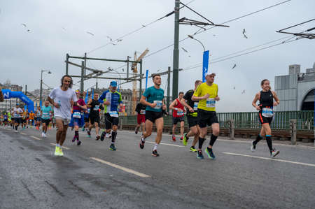 Istanbul, Turkey - November 07, 2021: 43rd Istanbul Marathon. Athletes running in 43th Istanbul marathon which includes two continents in one race. NKolay Istanbul Maratonuのeditorial素材