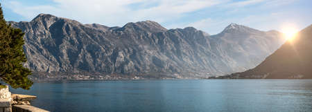 Bay of Kotor in Montenegro. Sunset over the bay of Kotor in Montenegro panorama of mountains....