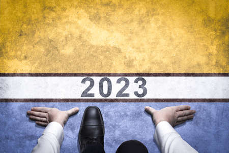 2023 year. Man is ready for start of 2023 New Year journey and future vision concept. Businessman on...