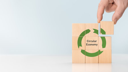 Circular economy concept, recycle, environment, manufacturing, waste, resources. LCA life cycle assessment. Sustainability Wooden cubes. symbol of circular economy. copy spaceの写真素材