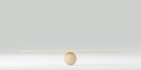 wooden scale balancing. Concept of equality and balance. balanced scales with empty space to place text or image. copy spaceの写真素材