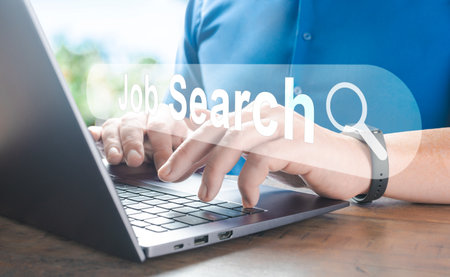 Search Engine Optimization SEO, data searching technology. Man's hands typing on laptop computer keyboard to search the information via internet web browserの写真素材