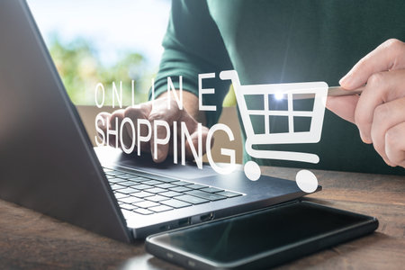 online shopping. Order in online store, shopping on internet, concept on virtual screen with hands typing on keyboard. Men hands using laptop computer for online shoppingの写真素材