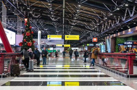 Moscow, Russia, February, 4, 2023: Sheremetyevo airport. hall with flight information monitors and cafe in Terminal C. Sheremetyevo is the largest airport in Russiaのeditorial素材