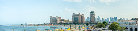 Panorama of public beach at Katara Cultural Center in Doha, Qatar. Katara beach and skylineのeditorial素材