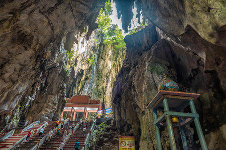 Batu Caves, Malaysia - February 22, 2023: Batu caves. Famous and iconic limestones with rainbow painting at Batu Caves. Cave is focal point of Hindu festival of Thaipusam and Deepavali in Malaysia.のeditorial素材