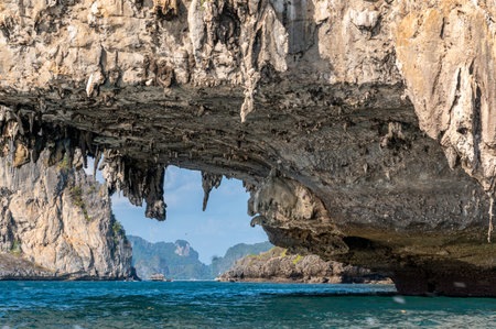 Phi Phi Le Islands, Krabi Province. Amazing nature scenic landscape with boat for traveler. beautiful seascape. Tourist on Long tail boat trip. amazing rocks from seaの写真素材