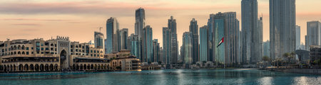 Dubai, United Arab Emirates - April 4, 2023: Panorama Burj Khalifa lake and Downtown Dubai In evening. Dubai Fountain is the world's largest choreographed fountain system. Travel in Arab Emiratesのeditorial素材