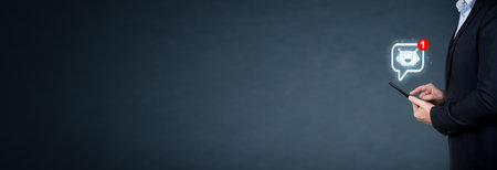 Businessman holding samrt phone with light chatbot hologram intelligence AI. Digital chatbot, robot application. Chat GPT chat with AI Artifice intelligent developers digital technology concept.の写真素材