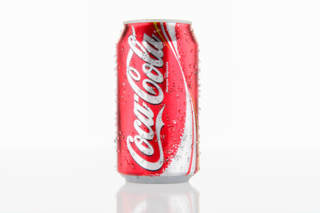 New York, USA - June 09, 2023: Classic Coca-Cola can on White Background. Coca-Cola Company is most...