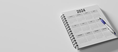 2024 white desk calendar on white background. Close Up Pencil On Calendar 2024. Pencil on calendar on white using as writing agenda or important memo and appointment and planning on calendarの写真素材