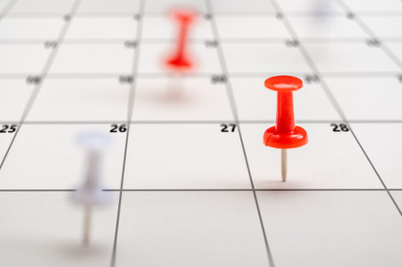 Colorful push pin calendar. Calendar page pinned in calender on date, business meeting schedule or travel planning concept. and reminder concept. Calendar appointmentの写真素材